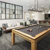 Modern resident lounge with pool table, TV, and gathering spaces at Arcadia at Symphony Park McDonough apartments